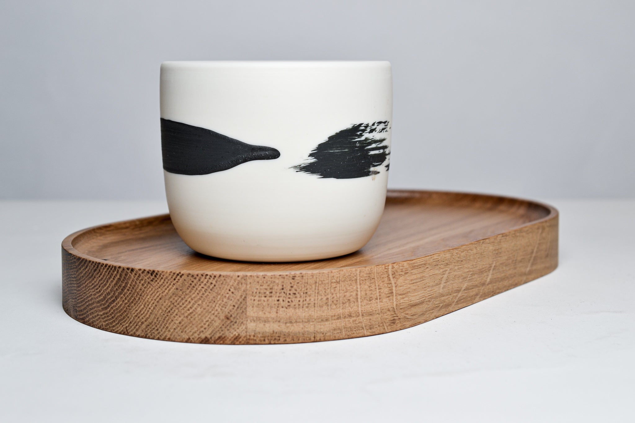 Wooden coaster for cappuccino and latte cups