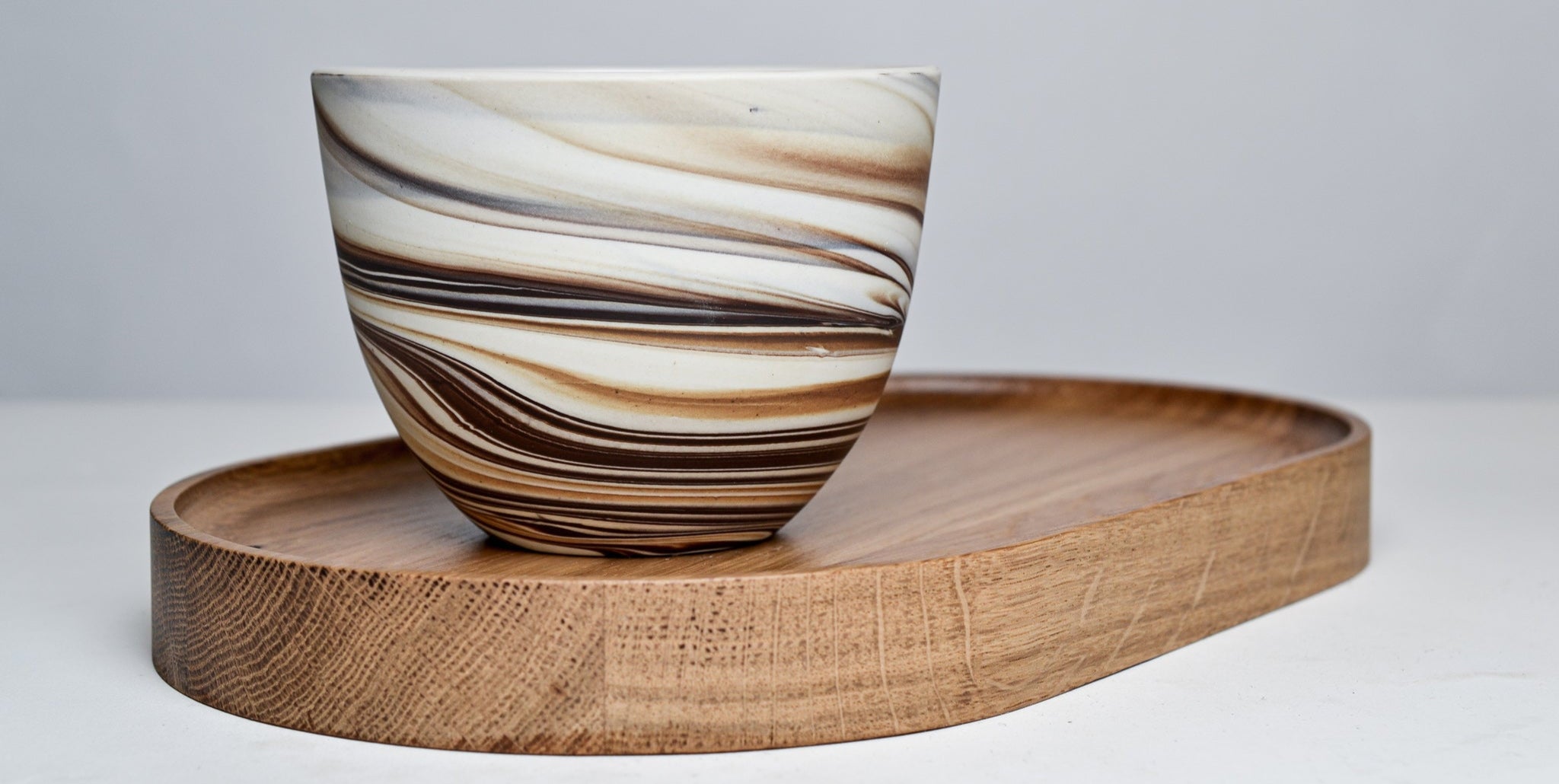 Wooden coaster for cappuccino and latte cups