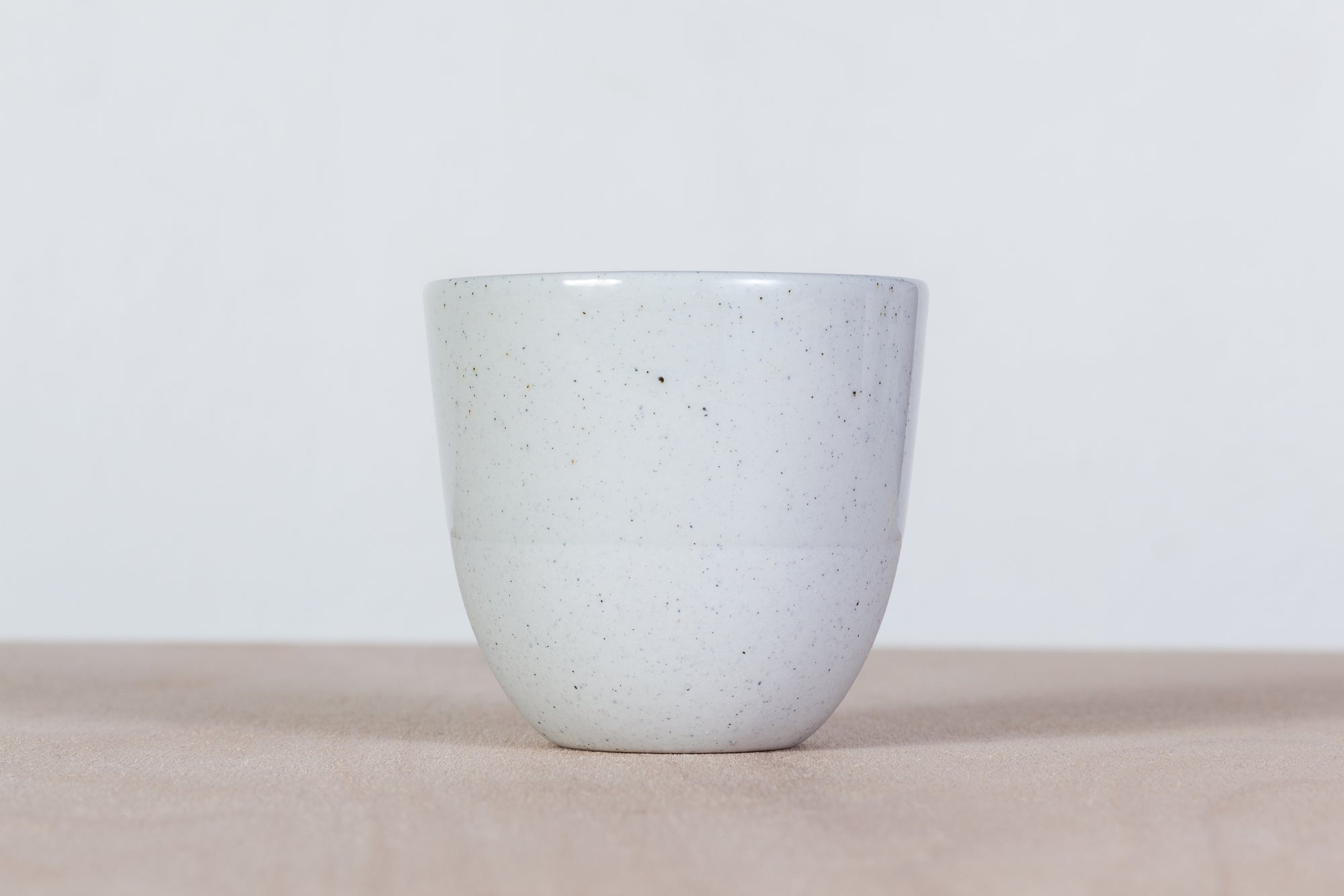 Simple gray cup with dots