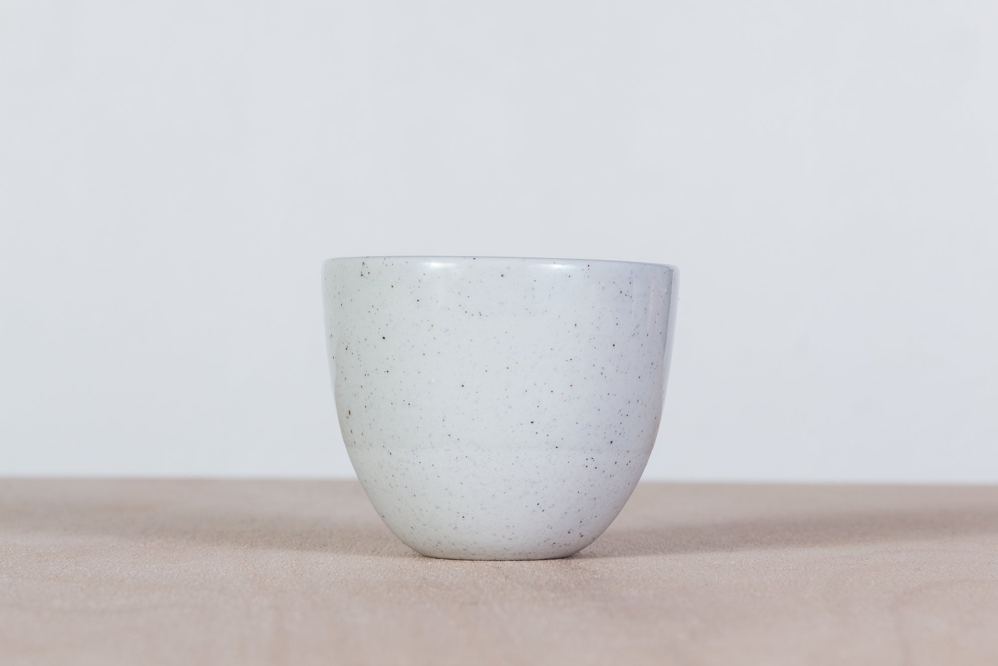 Simple gray cup with dots
