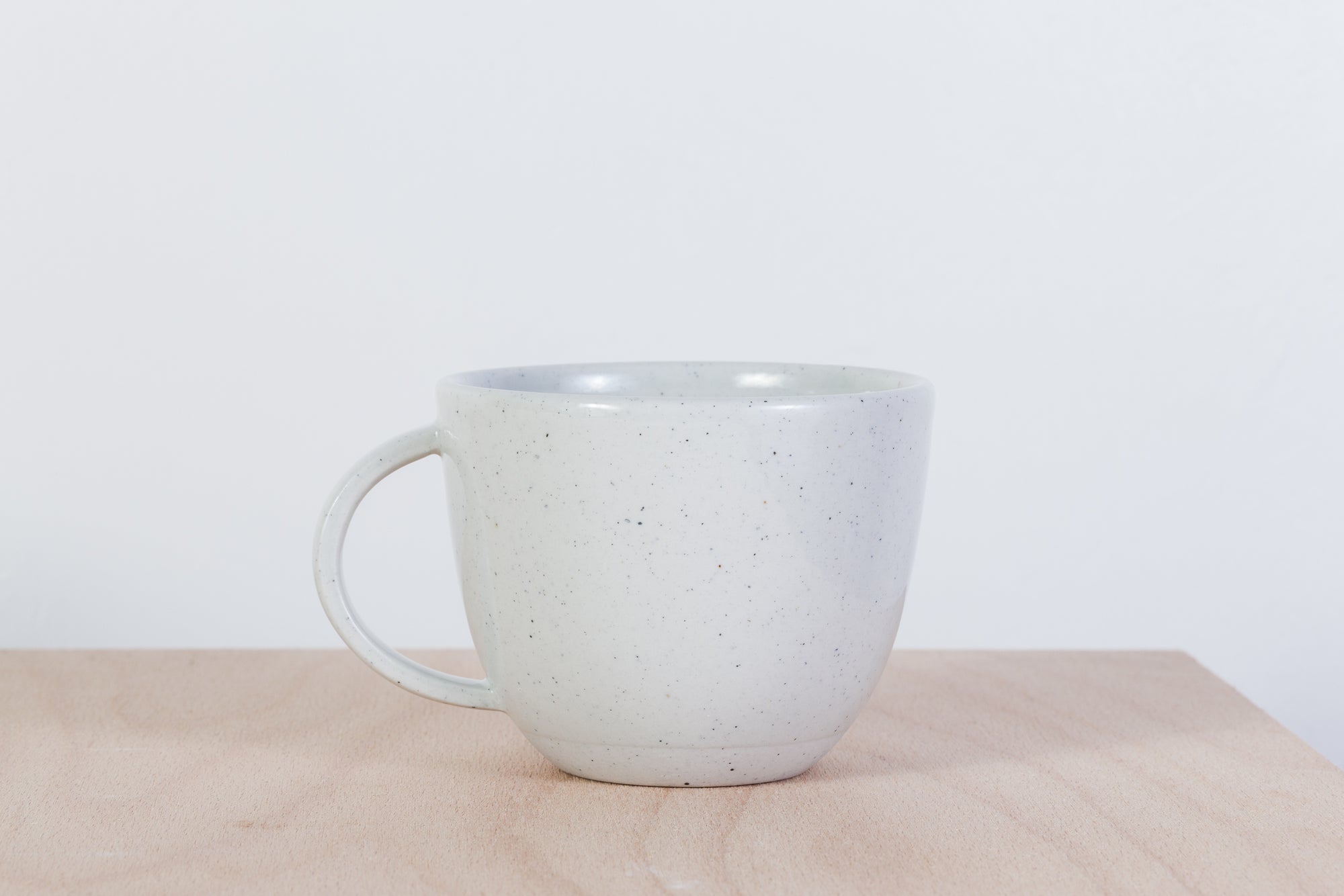 Simple gray mug with dots