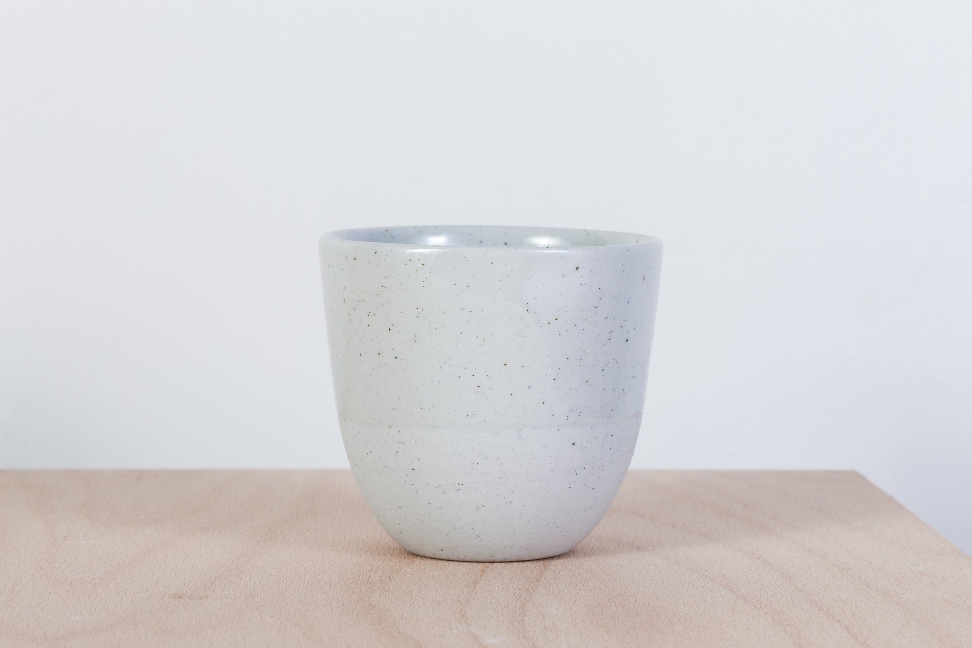 Simple gray cup with dots