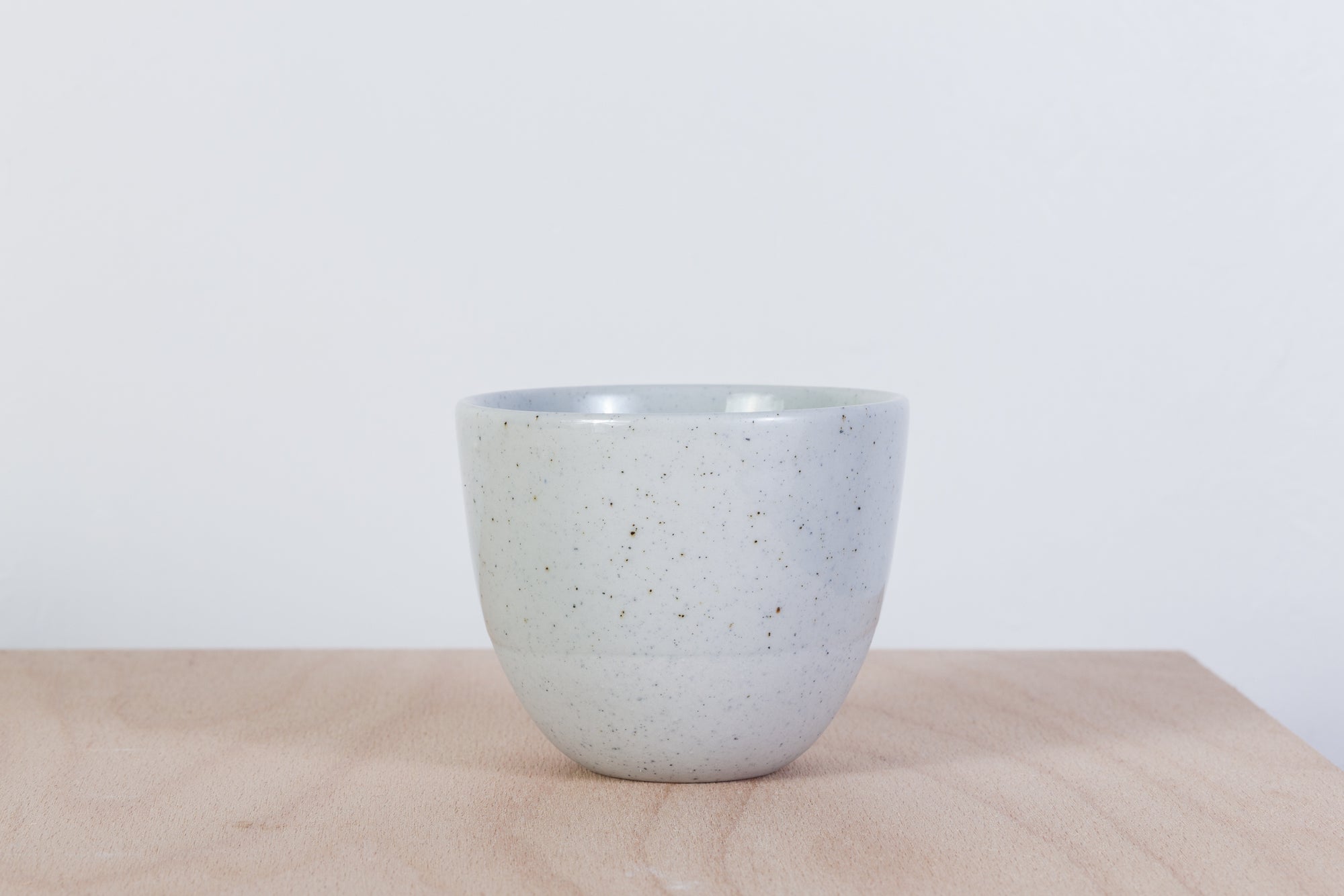 Simple gray cup with dots