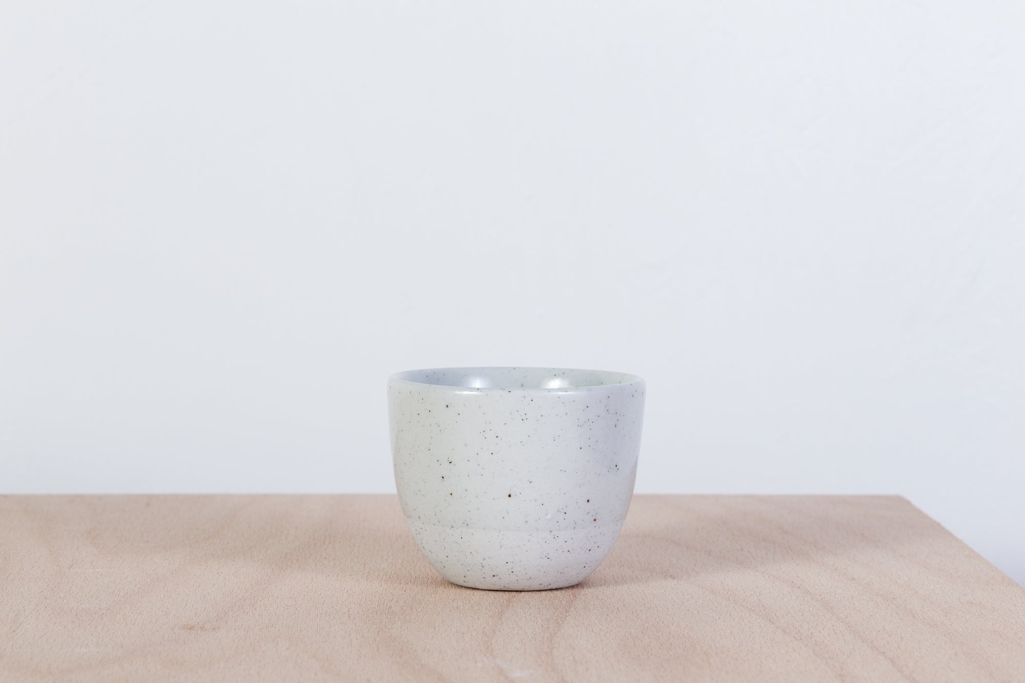 Simple gray cup with dots